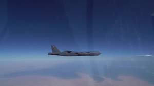 B-52 Stratofortresses fly in formation with U.S. Air Force F-15E Strike Eagles, Saudi Royal Air Force fighter jets, and U.S. Navy F/A 18 Hornets