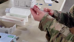 Washington National Guard dispense COVID-19 vaccines