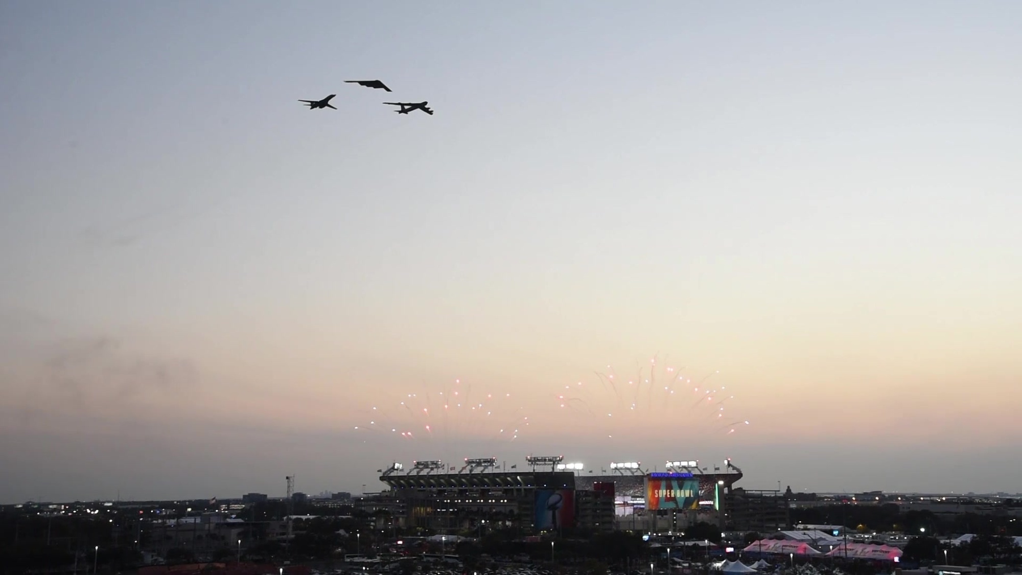A B-1B Lancer aircraft, Ellsworth Air Force Base, S.D., A B-2 Spirit aircraft, Whiteman AFB, M.O., and a B-52 Stratofortress aircraft, Minot AFB, N.D., fly over the Raymond James Stadium, Tampa, Florida during the Super Bowl LV Flyover, Feb. 7, 2021.