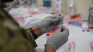 Team Travis administers COVID-19 vaccine b-roll