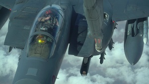 KC-10 Extender refuels F-15E Strike Eagles
