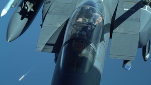 KC-10 Extender refuels F-15E Strike Eagles