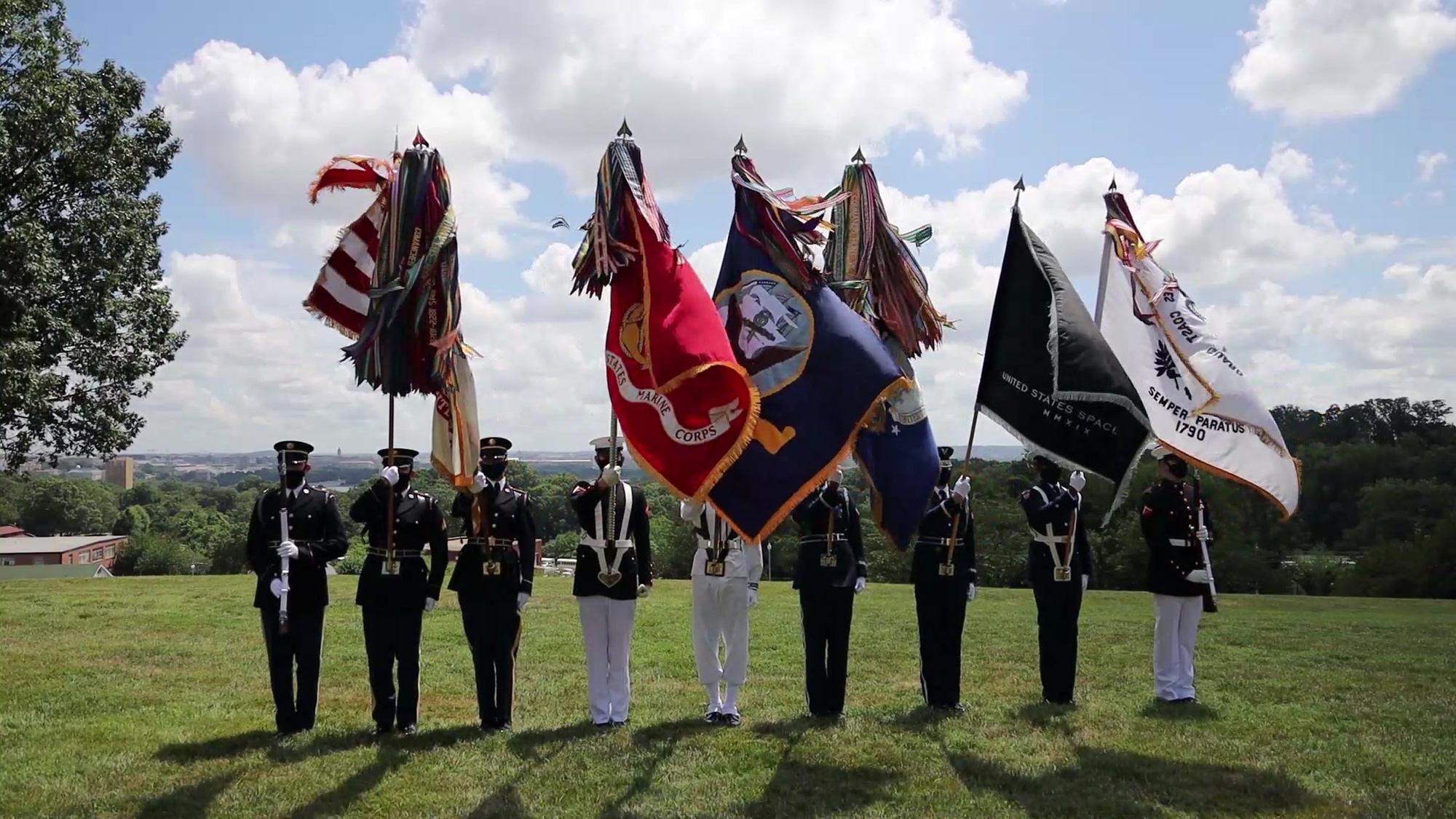 The Joint Armed Forces Color Guard conducts a presentation of colors at Whipple Field, Joint Base Myer-Henderson Hall, Arlington Virginia Mar. 1, 2021. (DOD courtesy video)