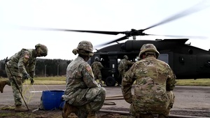 12th CAB Soldiers bring the heat during aerial gunnery training