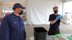 U.S. Coast Guardsmen assist at Dallas CVC