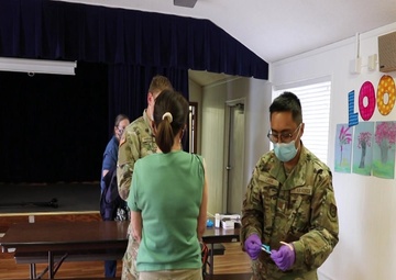 AZNG team-up with the Air Force Reserves to support a vaccination site in Wikieup Ariz.