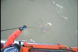 Coast Guard Air Station Detroit crew hoists 2 boaters in Sandusky Bay, Ohio