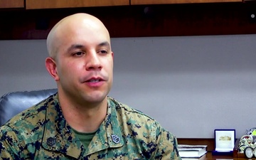 Marine recognized for dedication to students