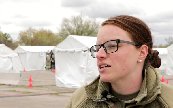 U.S. Air Force Staff Sgt. Ashley Wilson encourages community members to get vaccinated at the Gary CVC