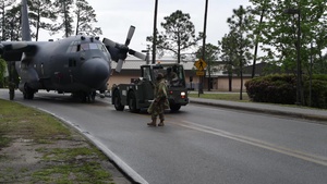 AC-130U towed to Hurlburt Field airpark