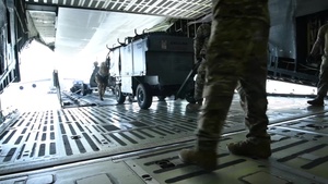 Reserve Citizen Airmen load up a C-5
