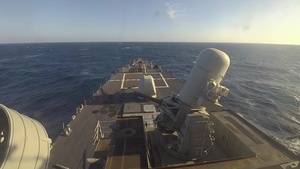 USS Ross fires its close-in weapon system