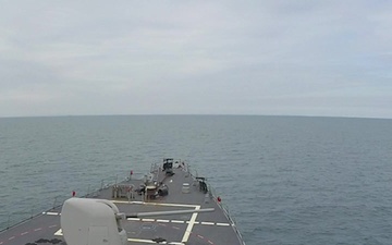 USS Ross fires its 5-inch gun during FOST