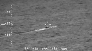 An AMO P-3 crew tracks a low profile smuggling vessel- second video.