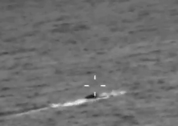 An AMO P-3 crew tracks a low profile smuggling vessel- second video.