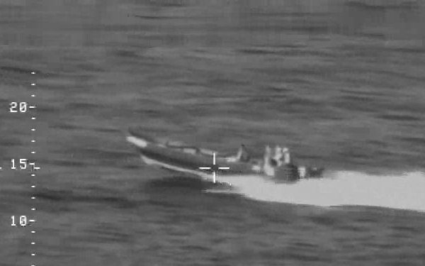 An AMO P-3 crew tracks a “go-fast” smuggling vessel.