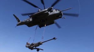 Operation Rolling Thunder 21.2: CH-53E external lift of M77 howitzers (B-Roll)