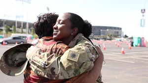 Cal Guard Soldier and mother celebrate reunion with COVID-19 vaccination