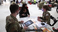 U.S. Air Force Maj. helps cousin receive COVID-19 vaccine at the Greenbelt CVC
