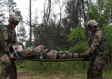 Maj. Stacy Black, an Army Reserve Medical Service Corps Officer, discusses the Expert Field Medical Badge event at Fort McCoy