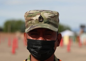 4th Infantry Division Soldiers wish their fathers a happy Father's Day at the Community Vaccination Site in Pueblo, Colorado
