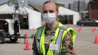 U.S. Air Force Airmen help victim of a motorcycle accident in Indiana