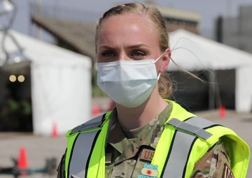U.S. Air Force Airmen help victim of a motorcycle accident in Indiana