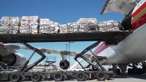 60th APS Airmen load pallets of medical supplies
