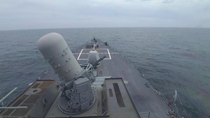 USS Ross fires its close-in weapon system