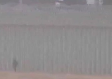 Border Agents Encounter Child along Border Wall