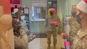 Col. Dunlap, 165th Airlift Wing commander, spreads holiday cheer