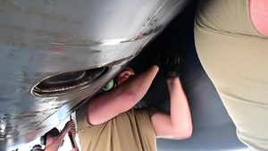 Preflight maintenance before a Bomber Task Force Europe sortie.