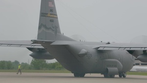 Airmen from the 120th Airlift Wing pick up Defenders from the 130th Security Forces Squadron.