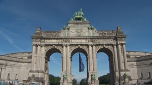 NATO flag flies under the Cinquantenaire Arch in Brussels
