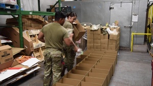 Arizona National Guard packs boxes at food bank