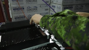 Members from 8 Air Communication and Control Squadron carry out test on a ground entry site