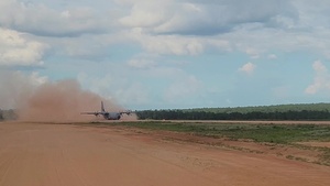 815th AS kicking up dust; letting cargo, personnel drop