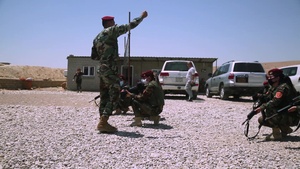Peshmerga female soldiers run through squad movement drills