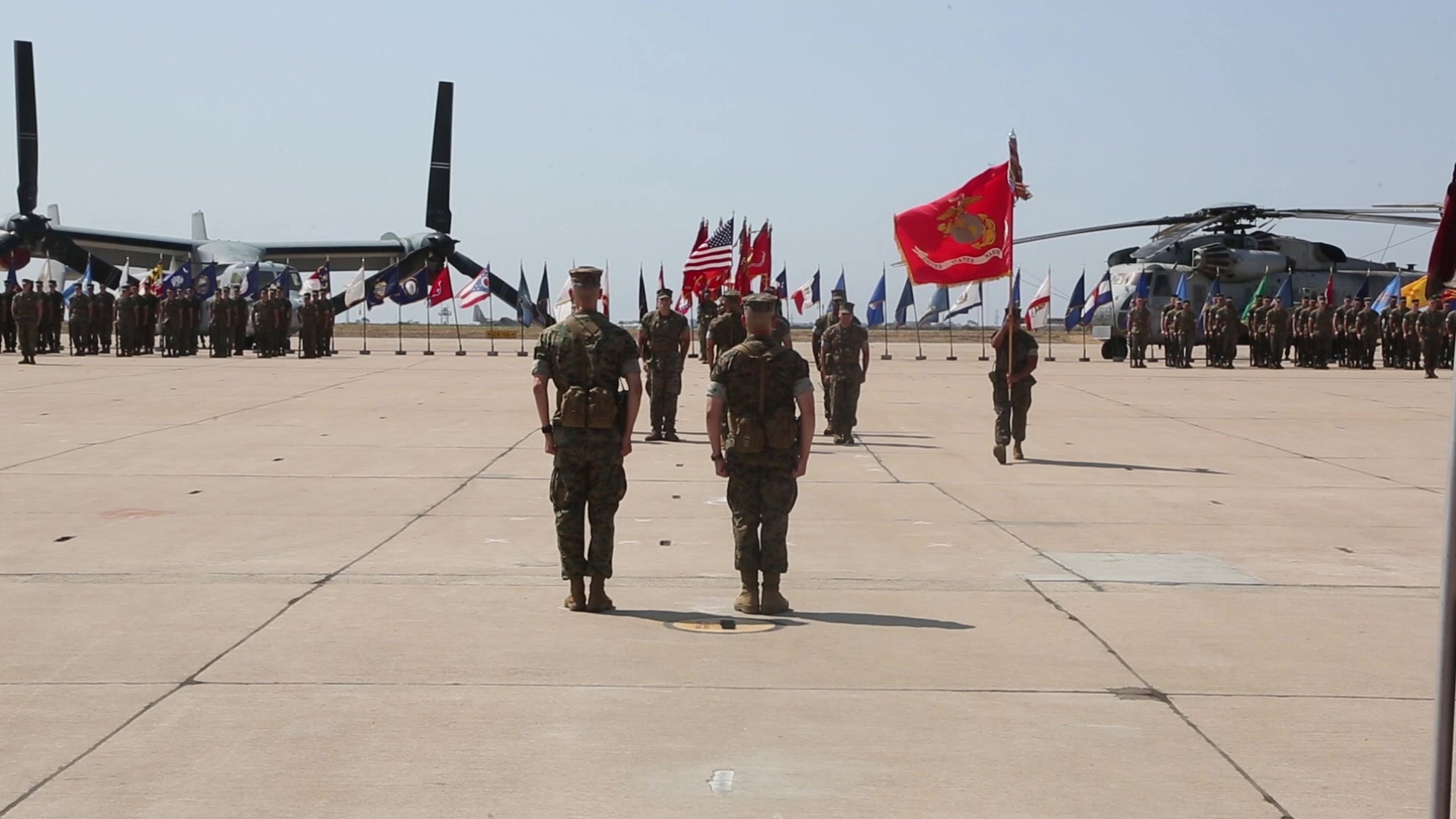 U.S. Marine Col. Eric Garcia, the outgoing commanding officer of Marine Aircraft Group (MAG) 16, 3rd Marine Aircraft Wing (MAW), and Col. Sean Hoewing, incoming commanding officer, MAG 16, 3rd MAW, conduct their change of command ceremony at Marine Corps Air Station Miramar, California, July 16, 2021. The change of command ceremony signifies transition of new leadership that will prepare the Marine Corps for the next generation of innovation, technology, and advancements to the force. (U.S. Marine Corps photo by Lance Cpl. Rachaelanne Woodward)