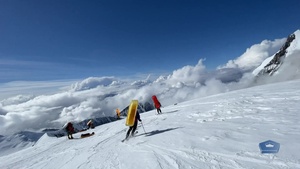 Hiking Team Skis Down Denali