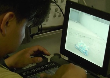 Explosive Ordnance Disposal technicians operate Telemax robot at Fort McCoy, WI