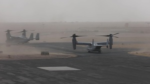 Two MV-22 Ospreys depart Camp Buehring