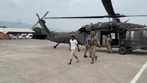 Army Blackhawk crews transfer medevac patient to Port-au-Prince, Haiti