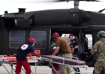 JTF-Haiti service members deliver Haitian patients to medical care