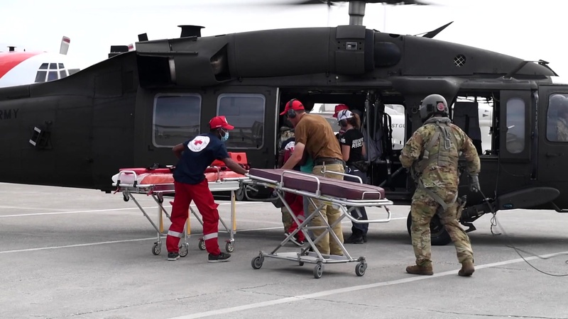 JTF-Haiti service members deliver Haitian patients to medical care