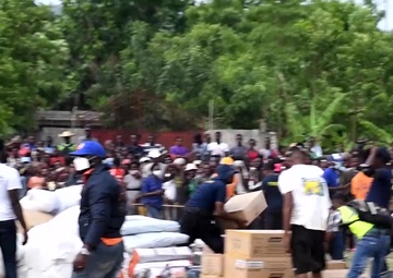 JTF-Haiti, 1-228th Aviation Regiment delivers humanitarian aid to residents in Maniche