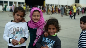 OAR evacuee children smiling for the camera
