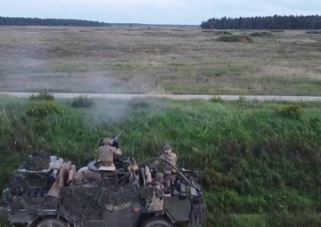 British Army's Poacher Troop practices reconnaissance fire and maneuver