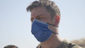 Civil Affairs soldier speaks with pod Afghan community leaders