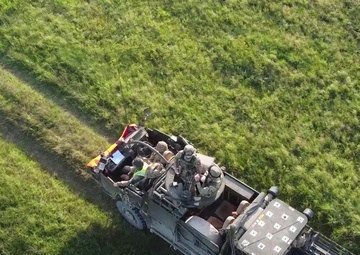 British Army's Poacher Troop practices reconnaissance fire and maneuver